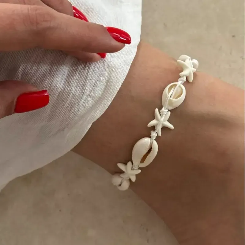 پابند صدف ستاره روی پا